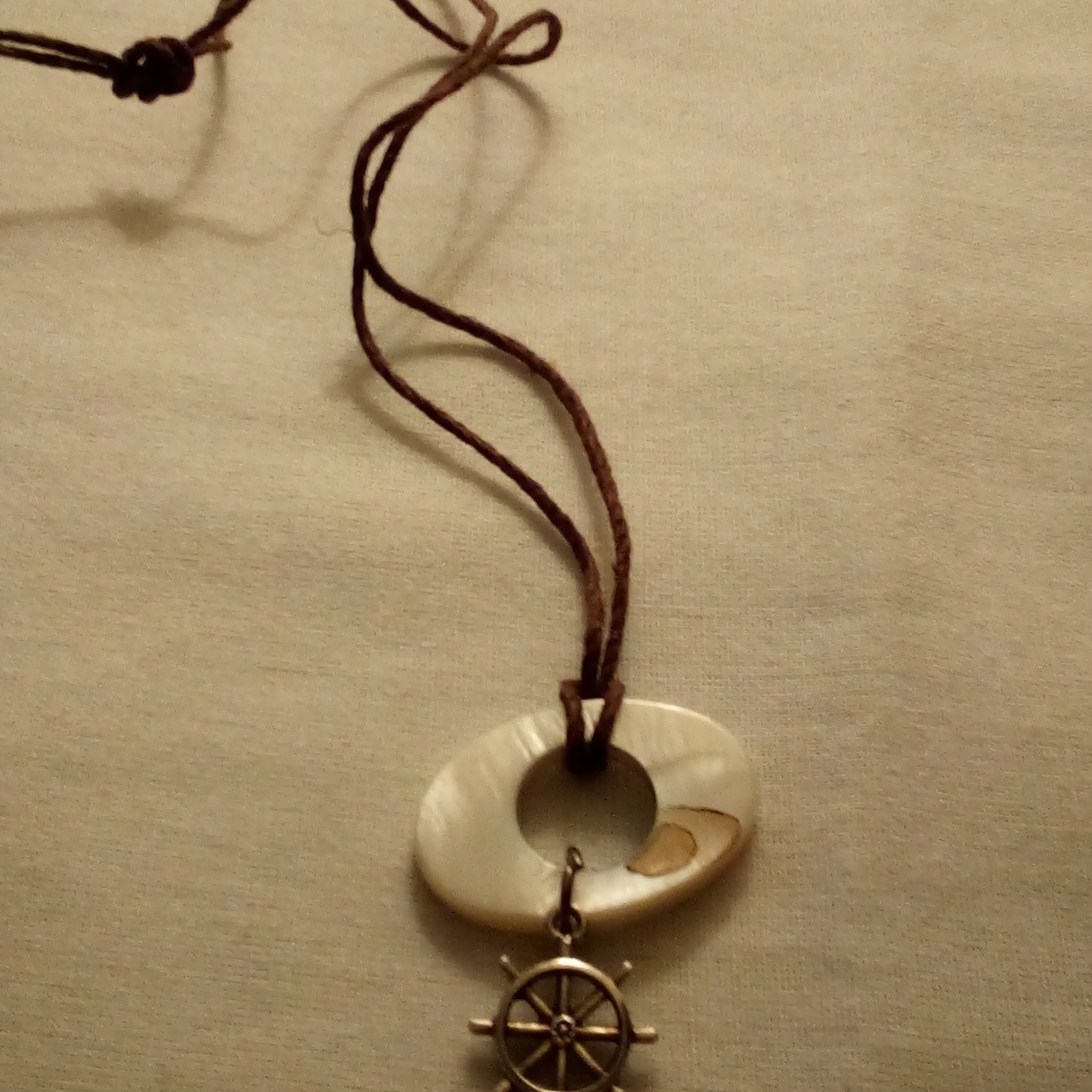 Tie on corded necklace with shell Slice and ship w
